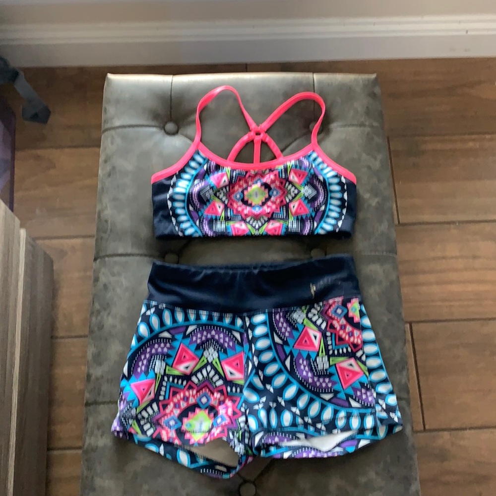 Used a little often. Bra and matching shorts.